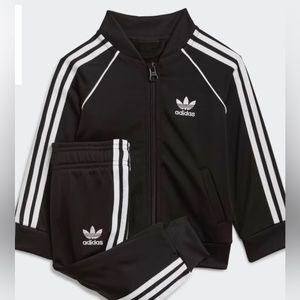 Kids Adidas track suit. Black and white